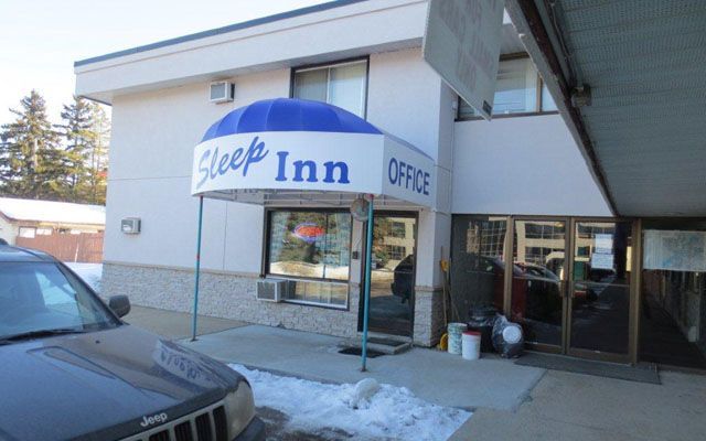 Sleep-Inn Motel logo